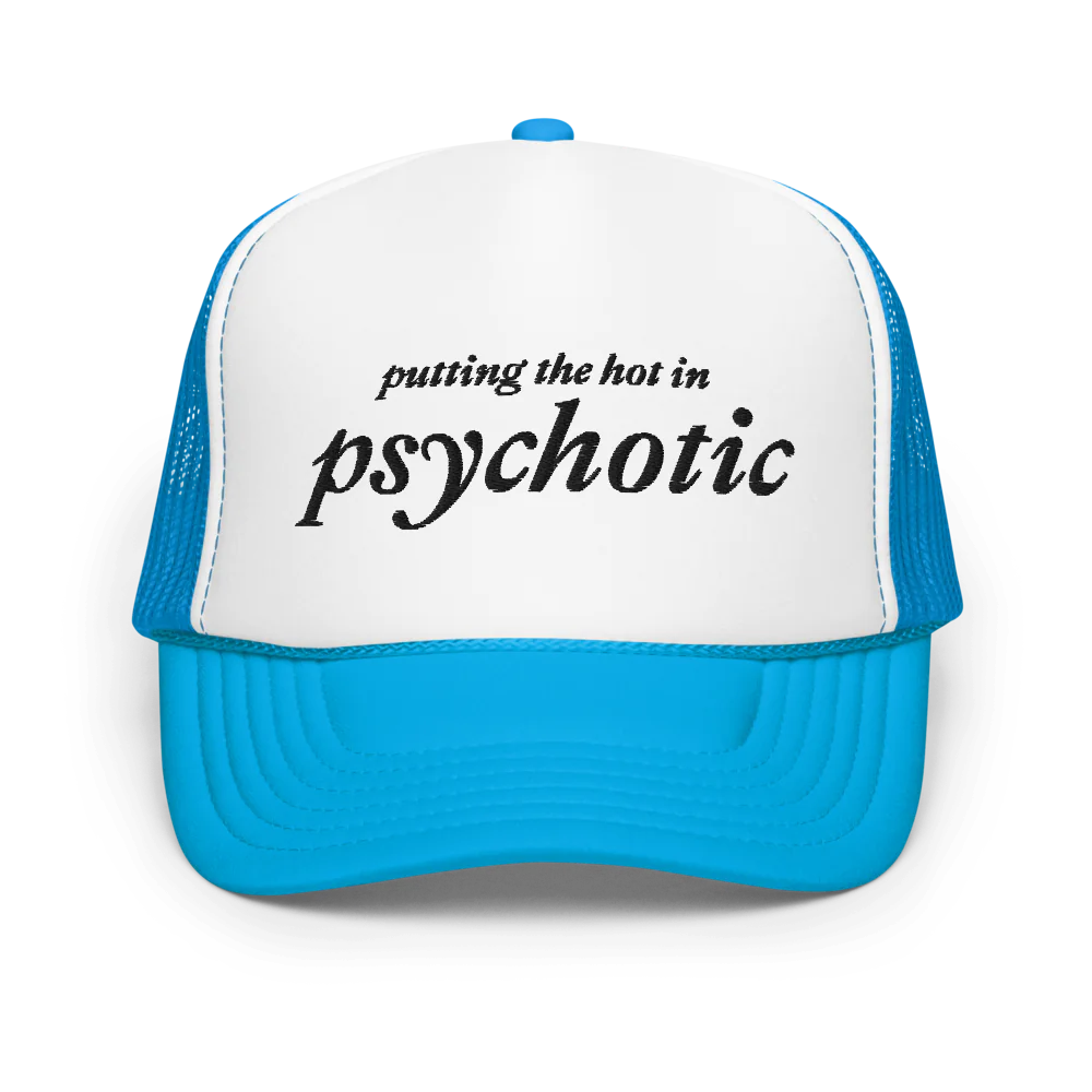 Blue and white trucker hat with embroidered black text that says "putting the hot in psychotic"