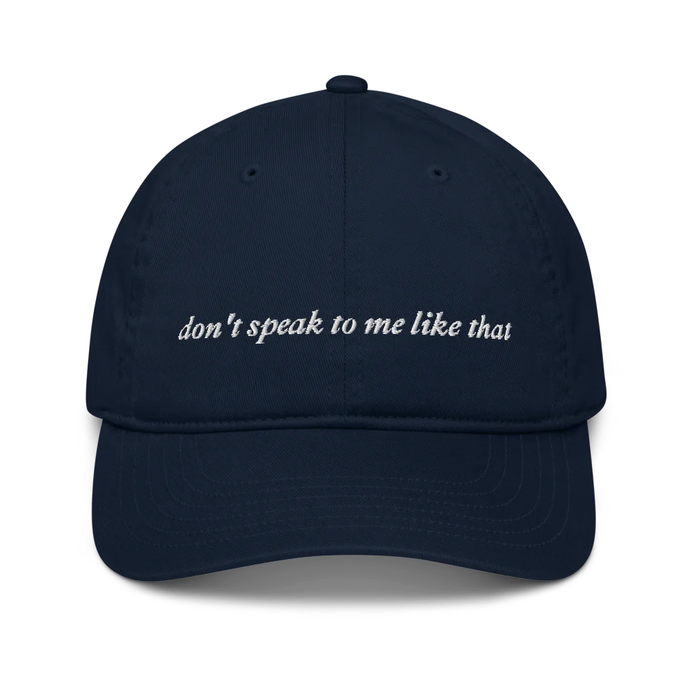 navy baseball hat with white text 'don't speak to me like that' embroidered in white