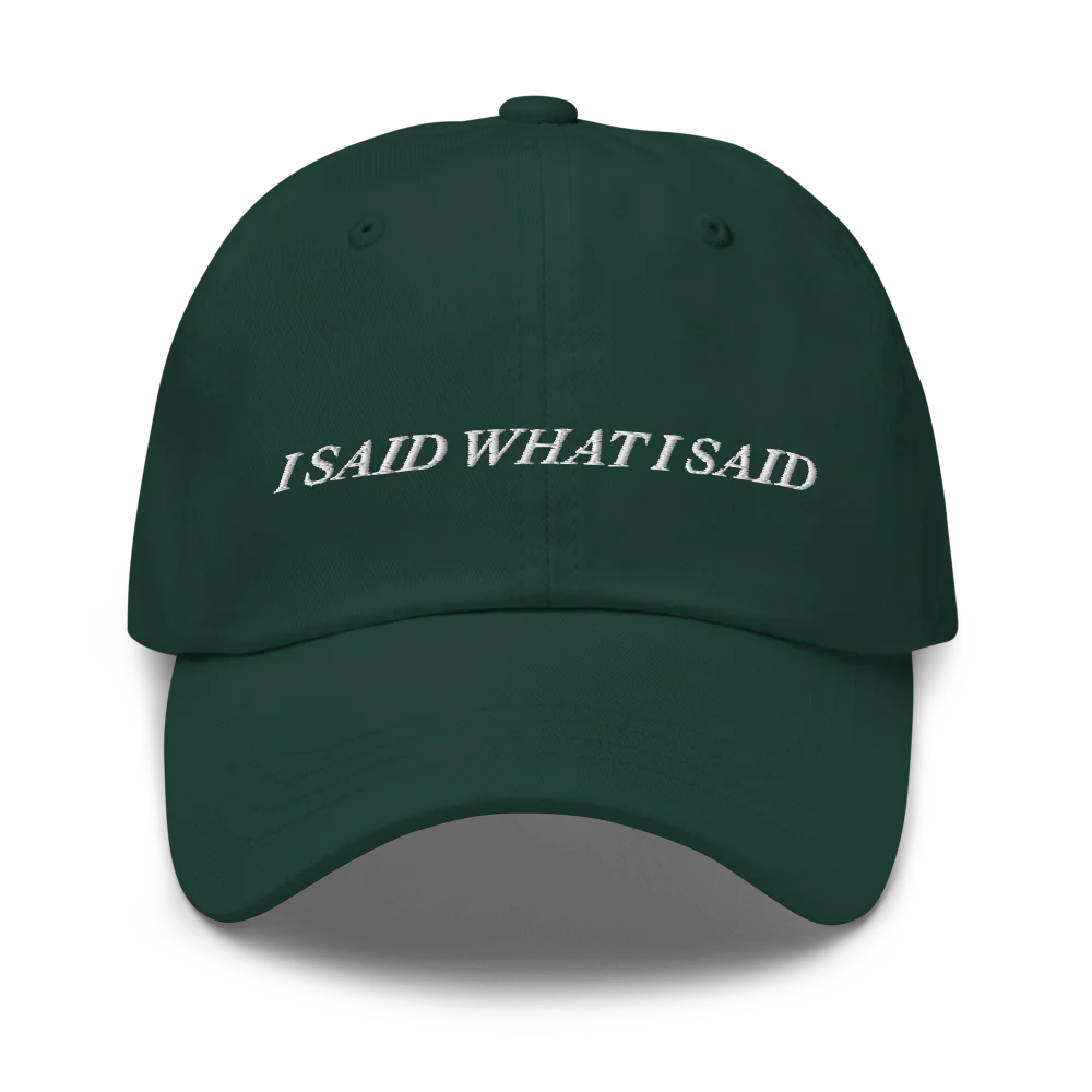 Green baseball hat with 'I SAID WHAT I SAID' text embroidered in white