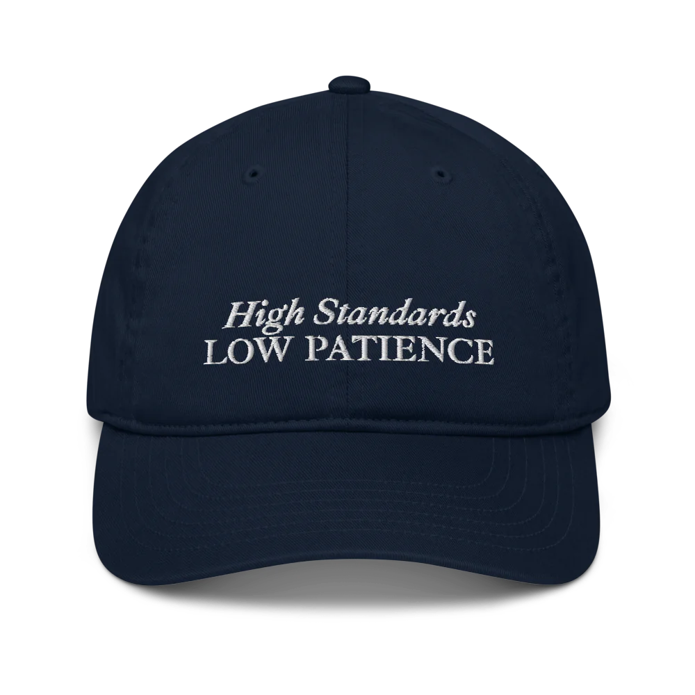 Navy Blue cap with 'High Standards Low Patience' text embroidered in white on a white background