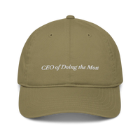 Green baseball hat with 'CEO of Doing the Most' text embroidered in white on a white background