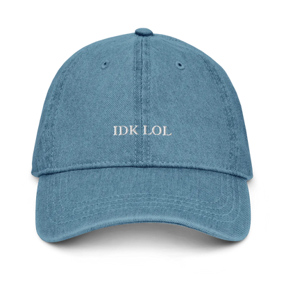 denim baseball hat with 'IDK LOL' text embroidered in white on a white background