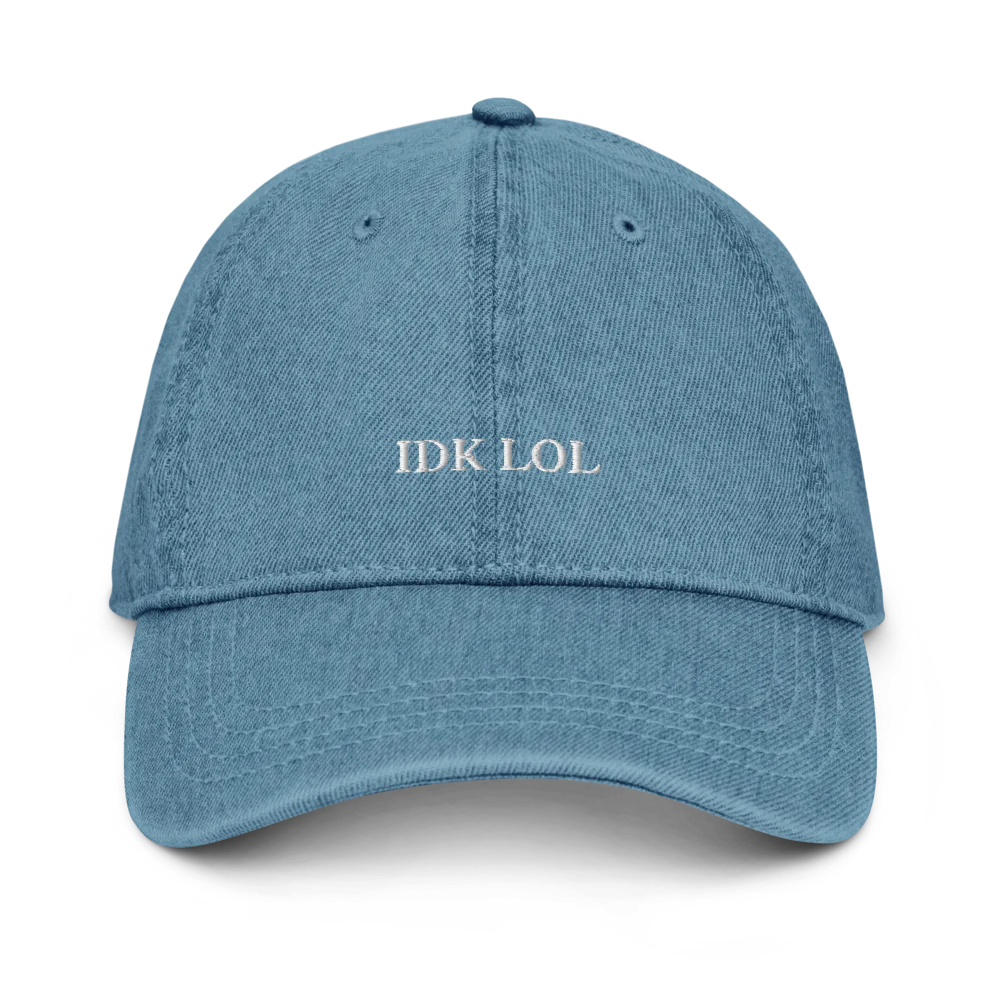 denim baseball hat with 'IDK LOL' text embroidered in white on a white background