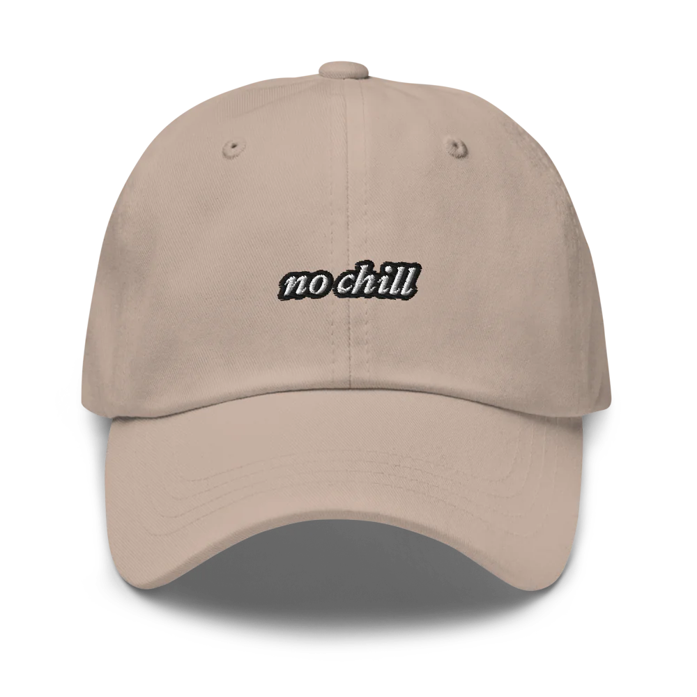 Beige baseball hat with 'no chill' embroidered text on a white background