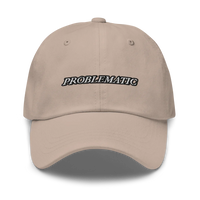 beige baseball hat with 'PROBLEMATIC' text embroidered on a white background
