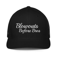black trucker hat with 'Blowouts Before Bros' text embroidered in white on a white background