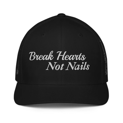 Black trucker hat with 'Break Hearts Not Nails' text embroidered in white on a white background