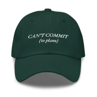 Green cap with text 'CAN'T COMMIT (to plans)' embroidered in white on a white background
