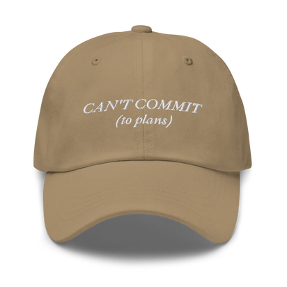 brown cap with text 'CAN'T COMMIT (to plans)' embroidered in white on a white background