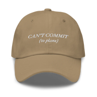 brown cap with text 'CAN'T COMMIT (to plans)' embroidered in white on a white background