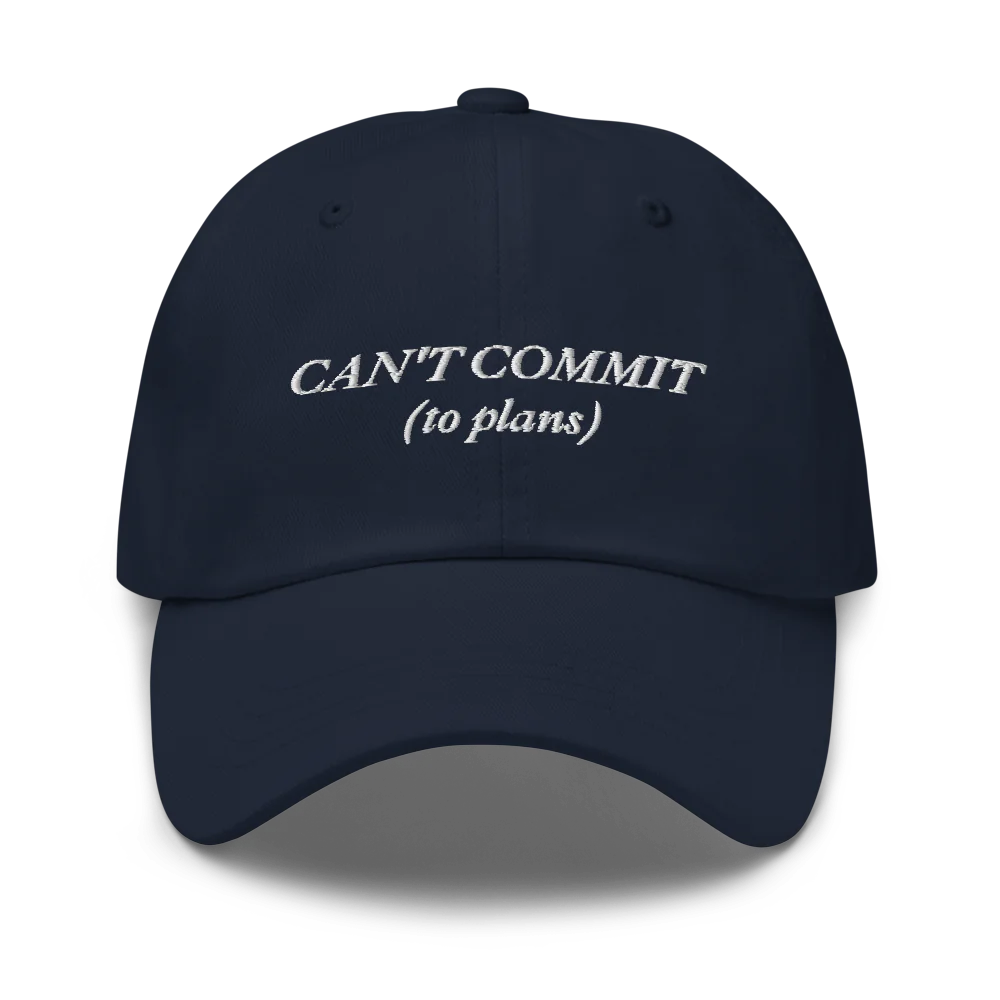 Navy Blue cap with text 'CAN'T COMMIT (to plans)' embroidered in white on a white background
