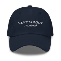 Navy Blue cap with text 'CAN'T COMMIT (to plans)' embroidered in white on a white background