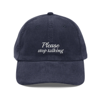 Dark Blue corduroy baseball hat with "Please stop talking" embroidered in white.
