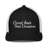 black and white trucker hat with 'Good hair Bad Decisions' text embroidered in white on a white background