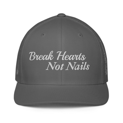 Gray trucker hat with 'Break Hearts Not Nails' text embroidered in white on a white background