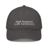gray cap with 'High Standards Low Patience' text embroidered in white on a white background