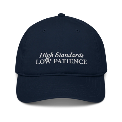 Navy Blue cap with 'High Standards Low Patience' text embroidered in white on a white background