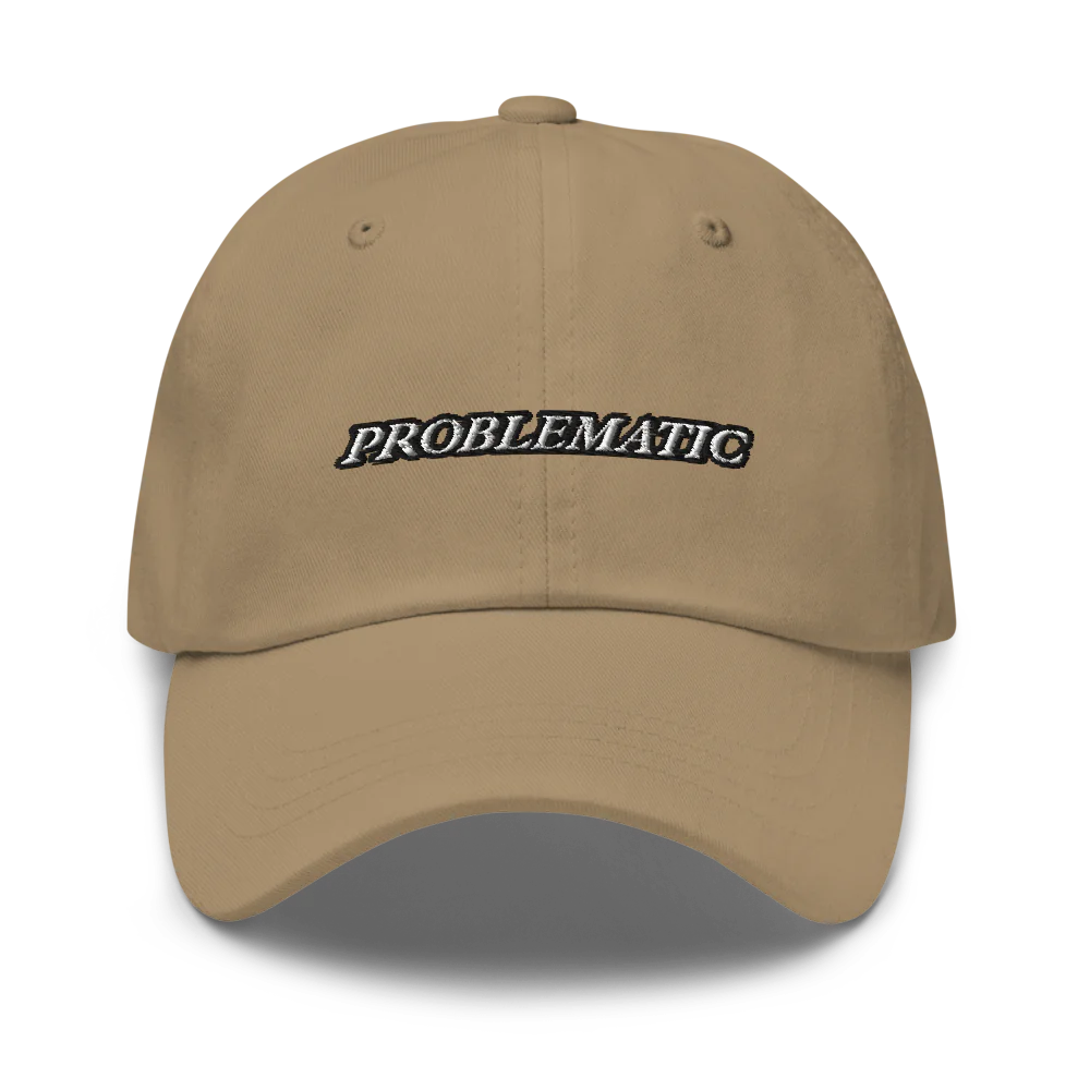khaki baseball hat with 'PROBLEMATIC' text embroidered on a white background