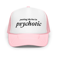 Pink and white trucker hat with embroidered black text that says "putting the hot in psychotic"
