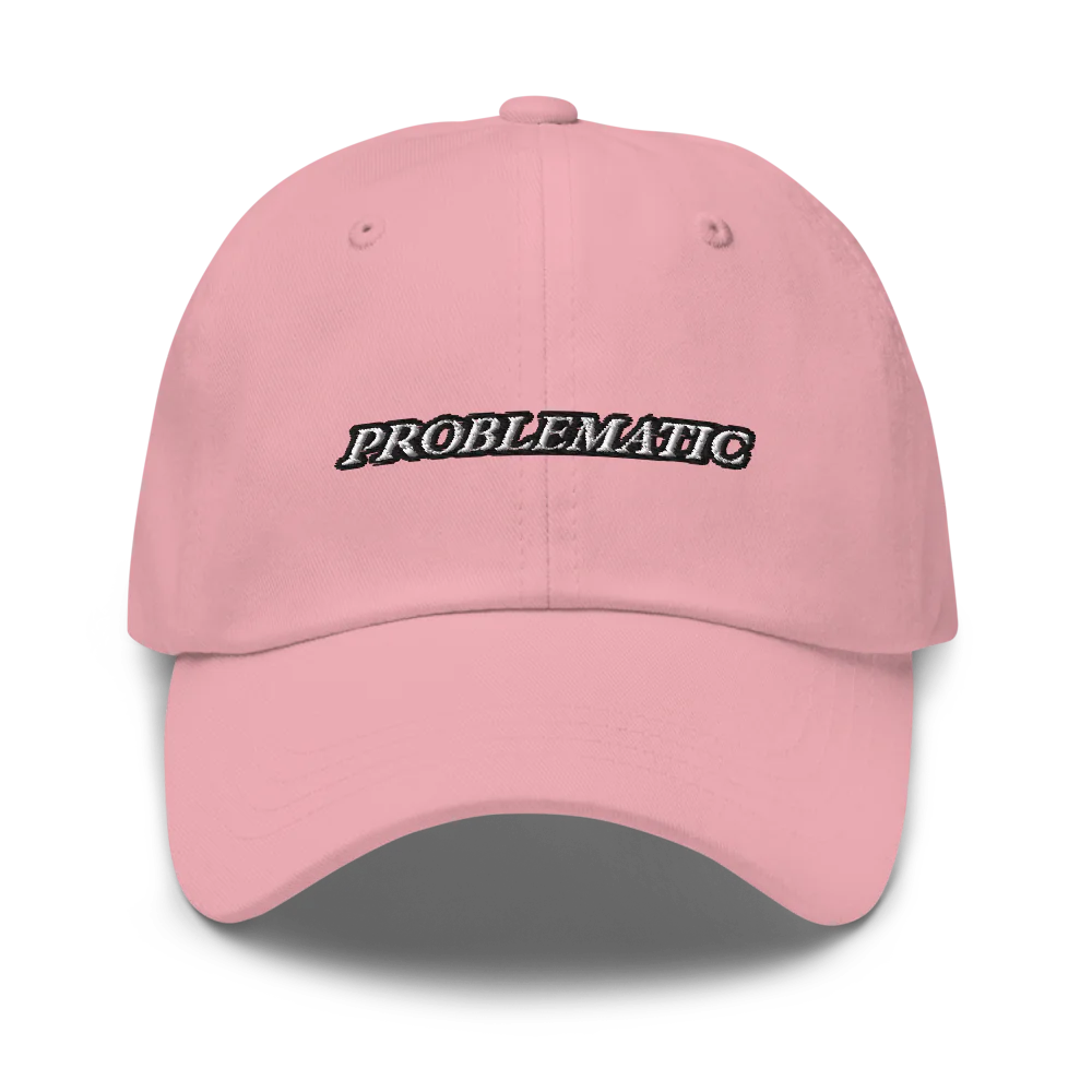 pink baseball hat with 'PROBLEMATIC' text embroidered on a white background