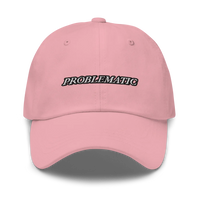 pink baseball hat with 'PROBLEMATIC' text embroidered on a white background