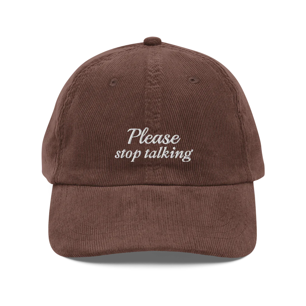 Brown corduroy baseball hat with "Please stop talking" embroidered in white.