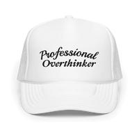 white trucker hat with 'Professional Overthinker' text on a white background